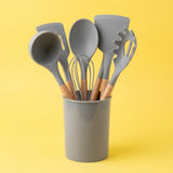 Grey Silicone Kitchen Utensil Set with Wooden Handles in Storage Holder
